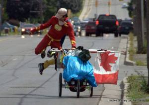 He likes to wear a Flash outfit and that's just fine with me.